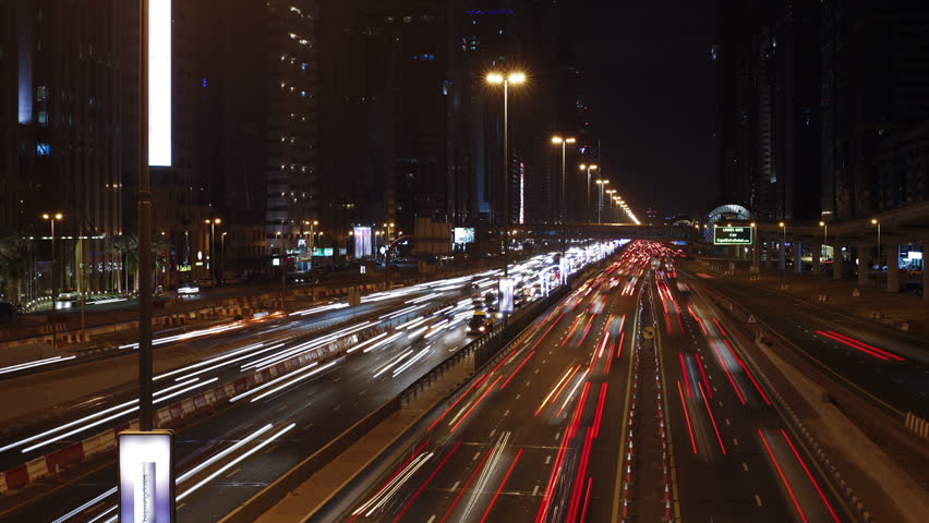 DUBAI, UNITED ARAB EMIRATES - CIRCA MAY 2011: Sheikh Zayed Rd, traffic and new high rise buildings along Dubai's main road at night