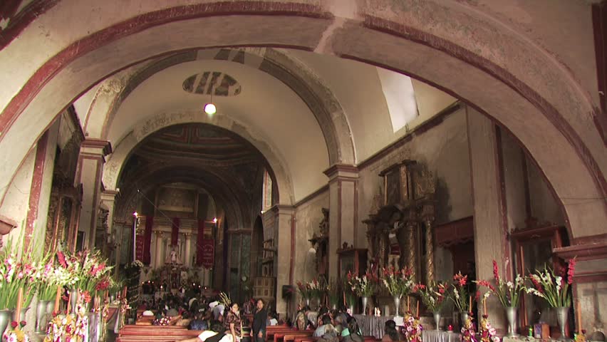 MEXICO - CIRCA 2010: Parishes Enter A Church for Mass