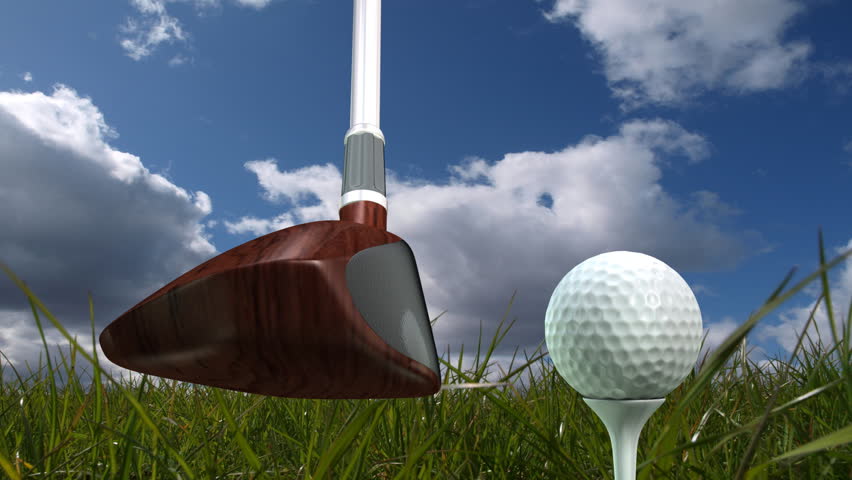 Golf ball hit off a tee. Very low camera angle so you can just see sky in the background.