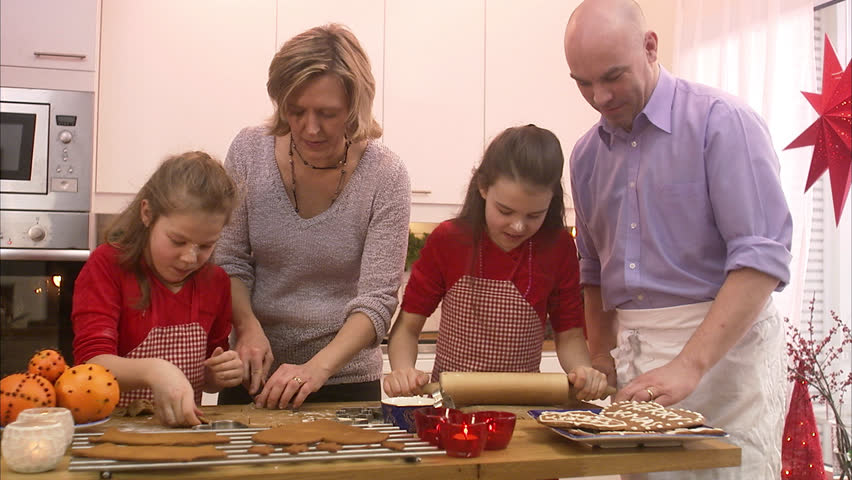 A family making gingerbread biscuits