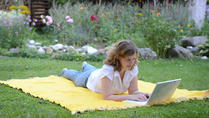 girl lies on a meadow