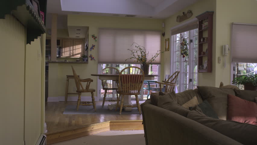 WS, DS, real estate agent showing the interior of a home to a couple