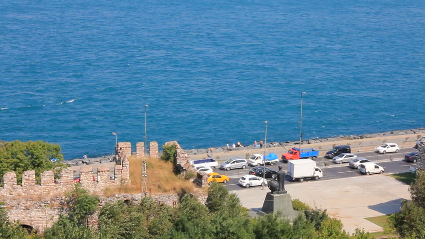 An Ancient Brick Wall built along the Bosphorus. The Bosphorus is a strait that forms the boundary between Europe and Asia and connects the Black Sea with the Sea of Marmara in Istanbul, Turkey. 