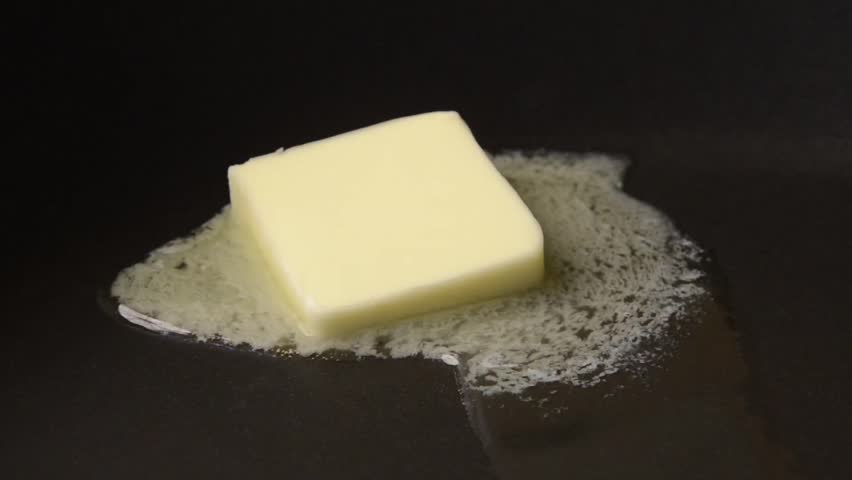 Slowly melting butter on non stick pan real time
