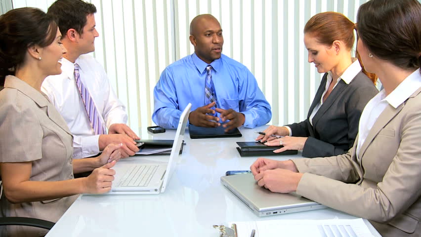 Male African American businessman concluding successful meeting advertising agency