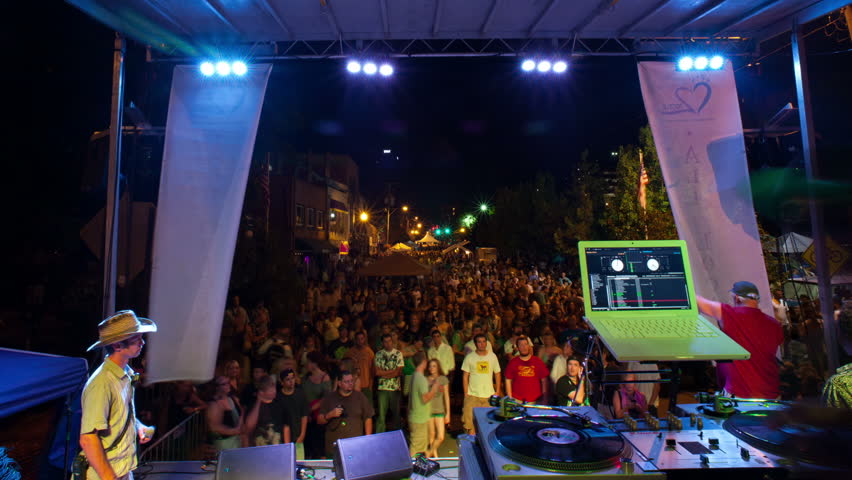 DJ rap music concert motion time-lapse on outdoor festival stage at night