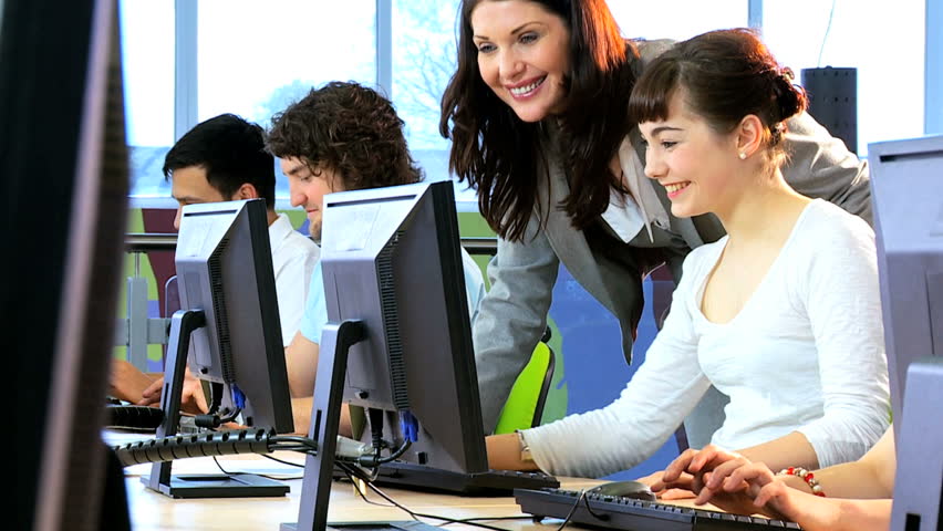 Caucasian female tutor and young college diverse students e-learning online education system