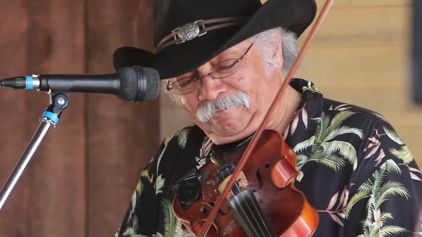 AGOURA HILLS, CA - MAY 20: A contestant fiddles away in a folk music band at the Topanga Banjo & Fiddle Festival in Agoura Hills on May 20, 2012. The long running festival is in its 52nd year.