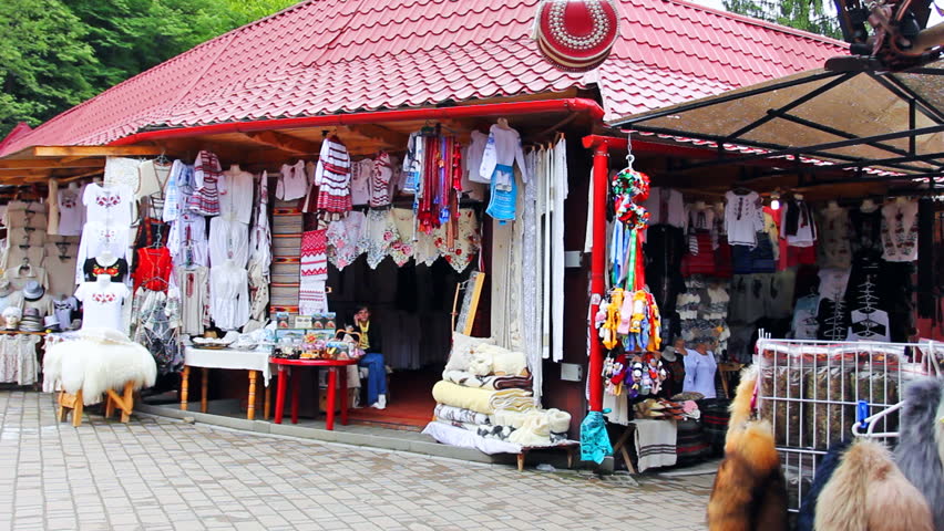 YAREMCHE, UKRAINE - MAY 29: Teens on Souvenir Market Yaremche in Carpathian mountains on May 29, 2012 in Yaremche, Ukraine. Souvenir Market Yaremche is tourist attraction and profitable at same time