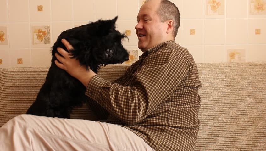 scottish terrier puppy and the owner