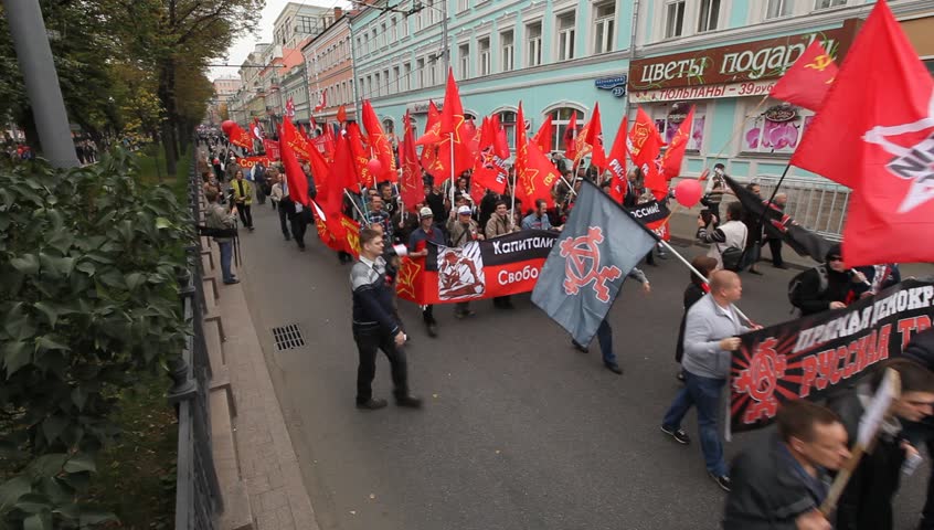 MOSCOW - SEPTEMBER 15: Opposition activists and supporters take part in an anti-Putin protest on September 15, 2012 in Moscow, Russia. Thousands marched through Moscow to protest against the rule of V.Putin.
