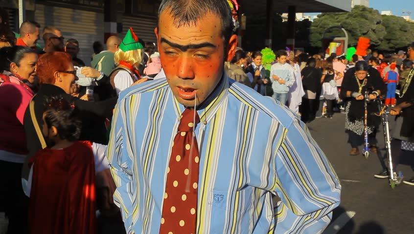 LAS PALMAS DE GRAN CANARIA, SPAIN - FEBRUARY 18: 200,000 masked revelers and a hundred or so festooned cars and floats in the Grande Parade (Gran Cabalgata ) of the Carnival February 18, 2012, Spain 