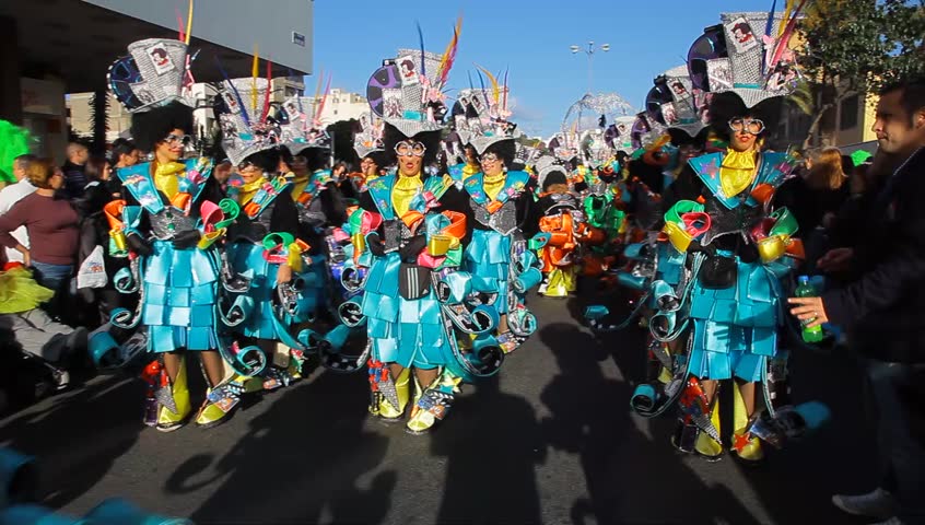 LAS PALMAS DE GRAN CANARIA, SPAIN - FEBRUARY 18: 200,000 masked revelers and a hundred or so festooned cars and floats in the Grande Parade (Gran Cabalgata ) of the Carnival February 18, 2012, Spain 