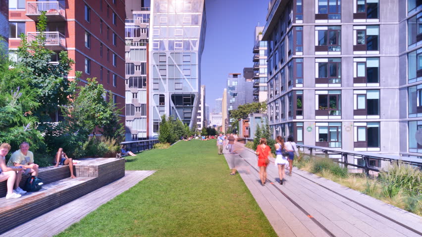 NEW YORK CITY - SEPTEMBER 13: (Timelapse) Pedestrians enjoy the High Line September 13, 2012 in New York, NY. The innovative linear park was opened in 2009 and is built on an elevated railway dating from 1934.