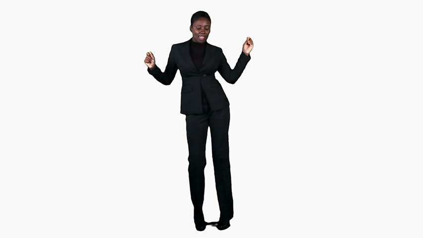 An attractive African American businesswoman dancing with satisfaction