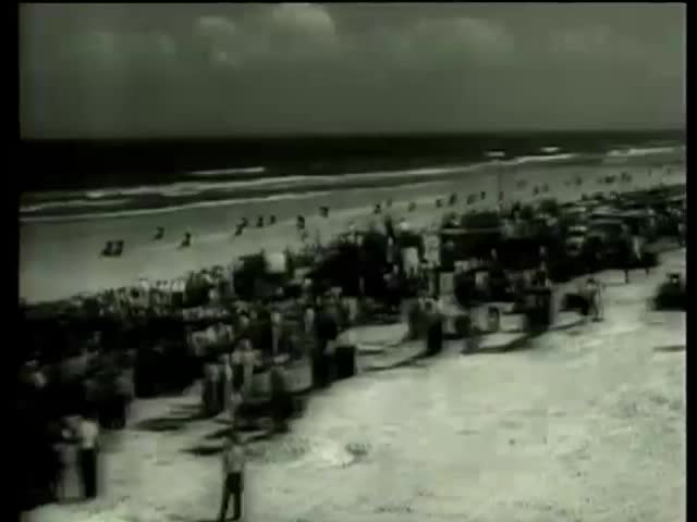 Daytona 200, a 200-mile (320 km) motorcycle race, at the Daytona International Speedway in Daytona Beach, Florida circa 1958-MGM PICTURES, UNIVERSAL-INTERNATIONAL NEWSREEL, USA, filmed in 1958