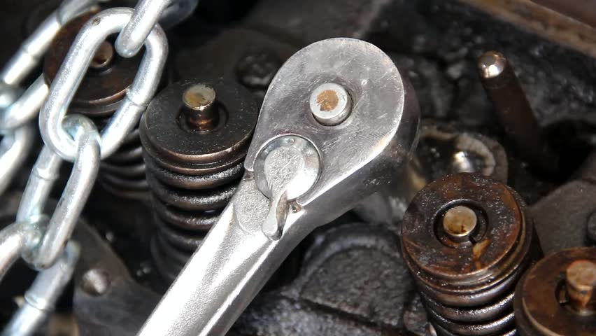 Ratchet Head Closeup In Action By Engine Valves