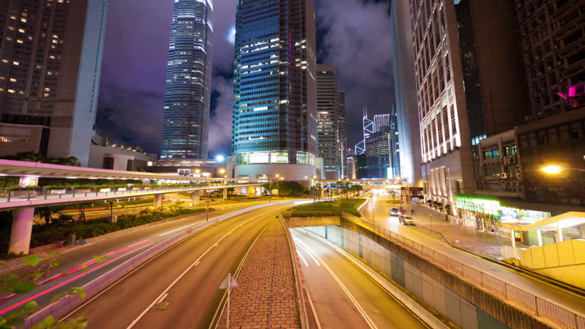 Street traffic in Hong Kong at night, timelapse in motion