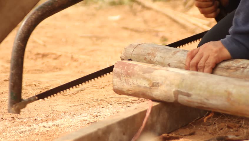 Man cutting wood.