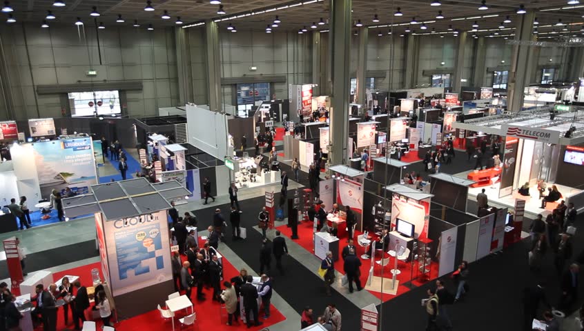 MILAN, ITALY - OCTOBER 17: Panoramic view of people visiting tech exhibition area at SMAU, international fair of business intelligence and information technlogy October 17, 2012 in Milan, Italy. 