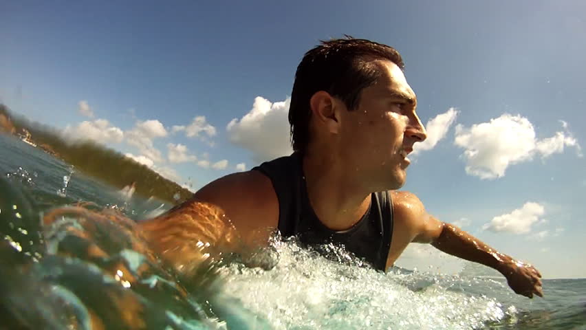 A Man Surfing in El Gigante