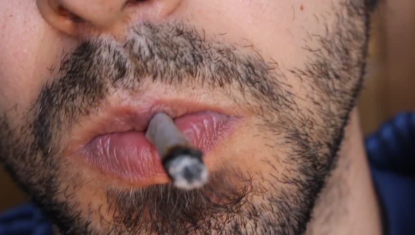 Detail of a person smoking