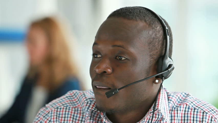 Call center operator providing the client with all the necessary information concerning a product or service