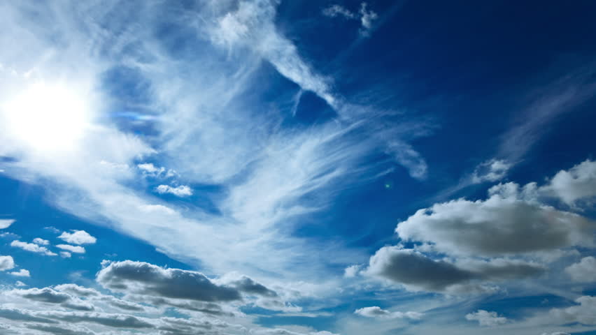 Heavenly Clouds. Deep Blue Sky.