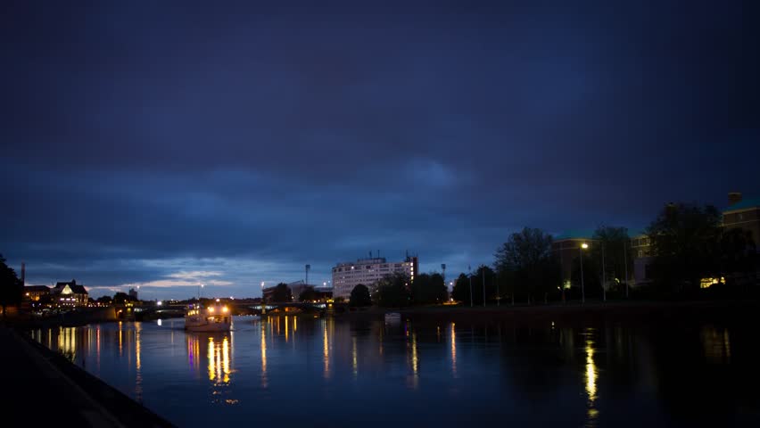 Boats lights on river timelapse