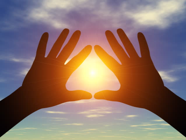 Computer-generated silhouette animation depicting hands held against a bright sun