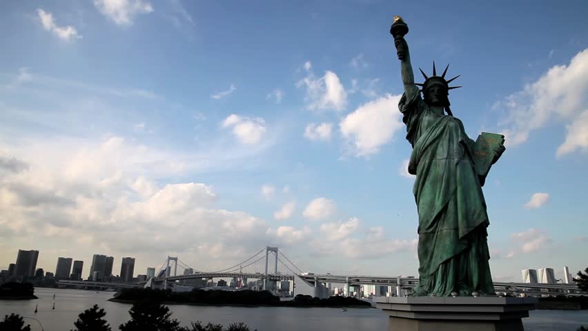 TOKYO, JAPAN â NOVEMBER 10: Statue of Liberty replica at Odaiba, overlooking the Rainbow Bridge in Tokyo Bay November 10, 2011