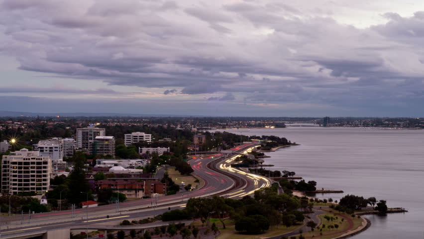 Time Lapse of the Swan River and Kwinana Freeway in Perth, Australia, from dusk to night.