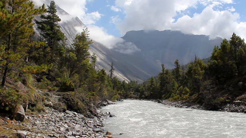 HD video of a river in Nepal running through a mountain range