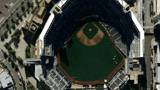 Extreme zoom out of the baseball stadium of San Diego, CA to space 
