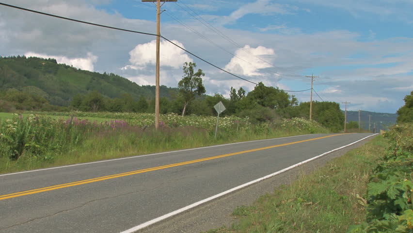 Two Pickup Trucks on Rural Highway