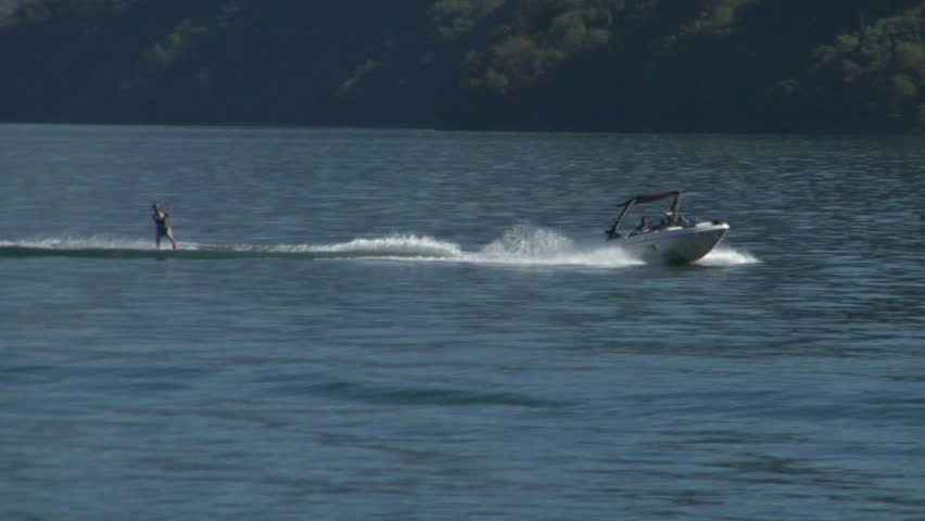 COMO LAKE, ITALY: A young man jumps the wake behind a boat during the "Wakeboard Tour Lario" on 15 september 2012, Como Lake (Italy)