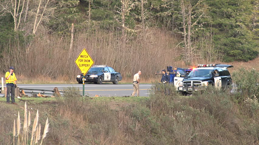 BLUE LAKE, CA - CIRCA 2012: Tragic loss of control on California's Highway 299 resulted in a car spinning, smashing through the end of the guardrail, and plummeting down a steep hillside.