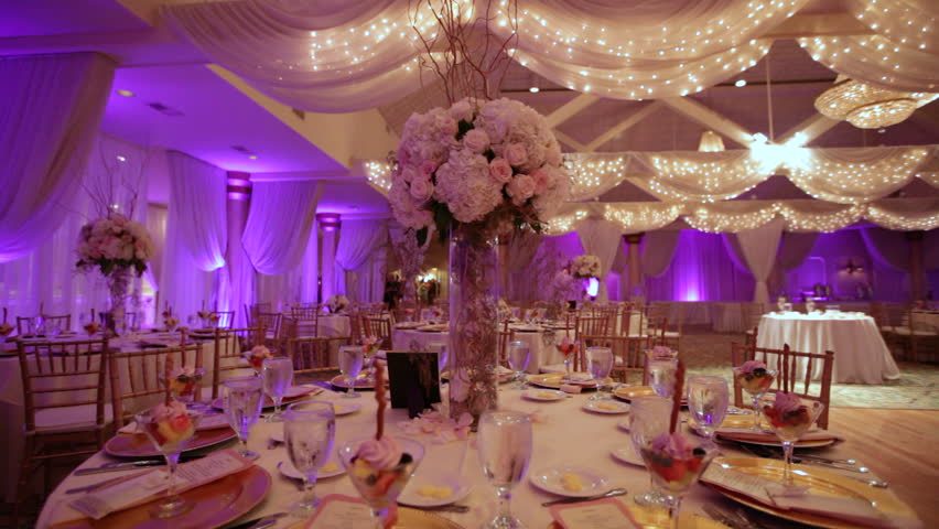 Wedding table setting with up lit room