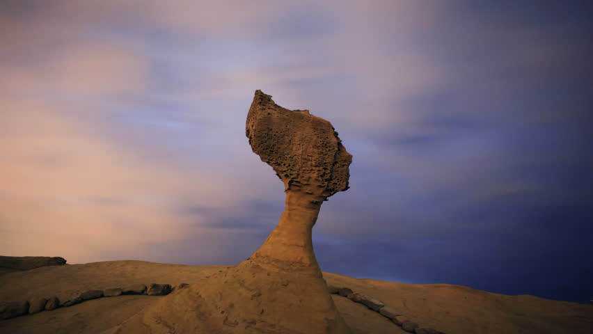 Dramatic clouds over the beautiful queen's head rock, New Taipei, Taiwan, timelapse