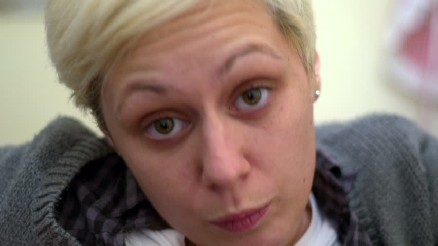 SUPER 35MM CAMERA - young woman close-up making faces and funny imitations 