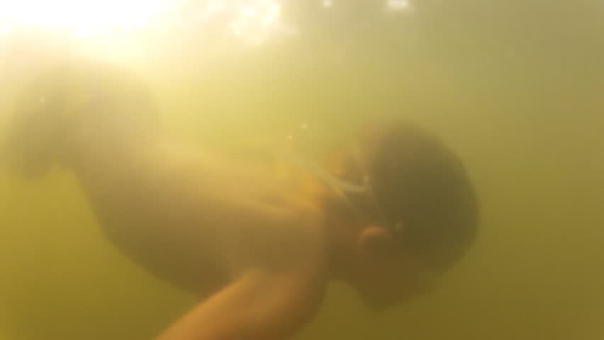 Boy swimming underwater