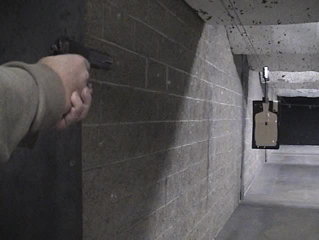 shooting a .45 cal pistol in a gun range
