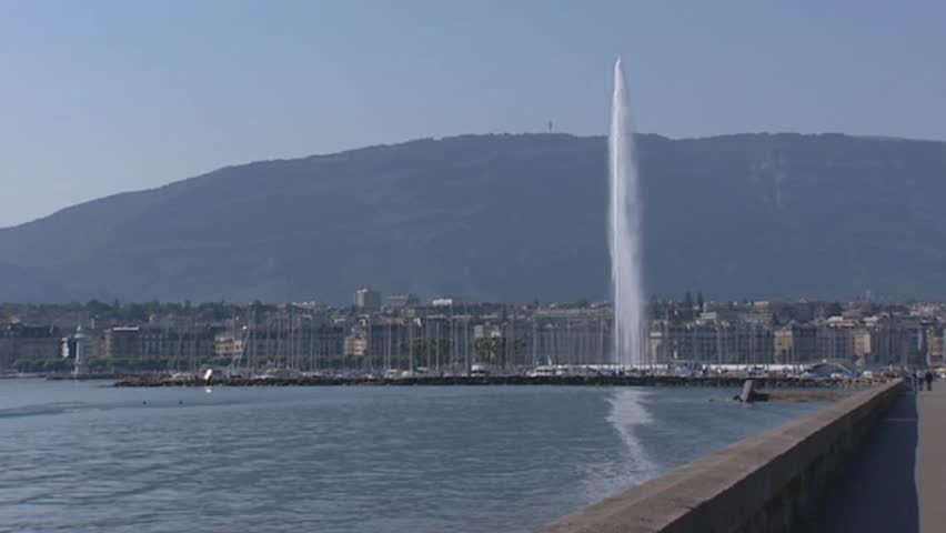 GENEVA, SWITZERLAND: skyline city + fountain, water jet.  Geneva's water-jet is one of the largest fountains in the world