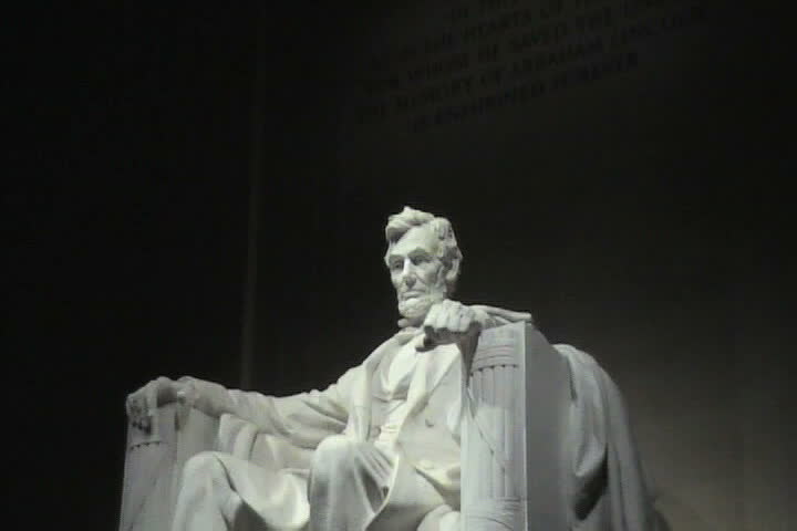Statue of Abraham lincoln in Lincoln Memorial Washington DC at night