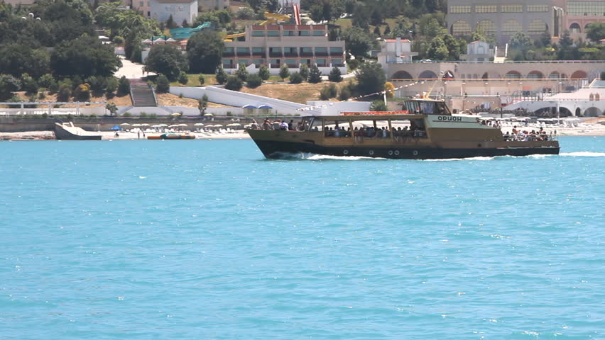Pleasure boat floats on the sea