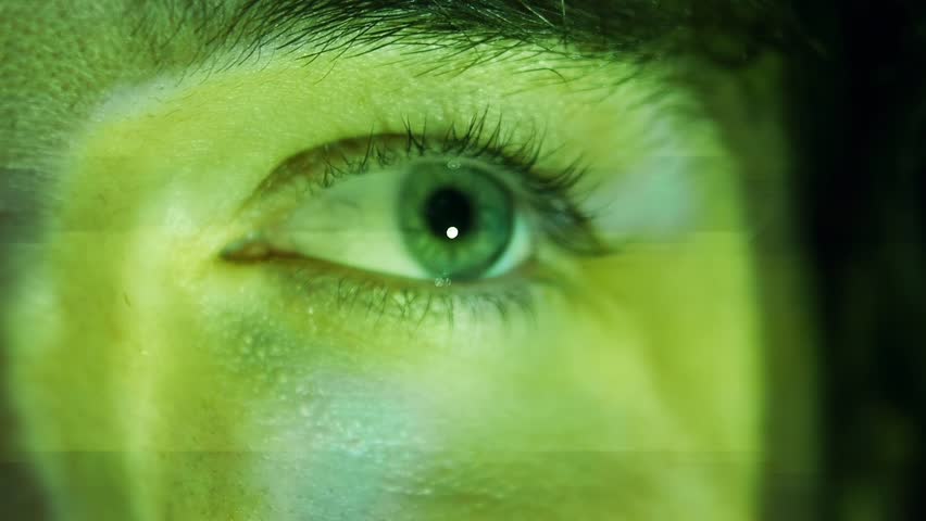 blue male eye in the lightning