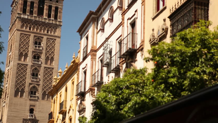 View of the famous Seville mosche with its Giralda minaret in a typical day