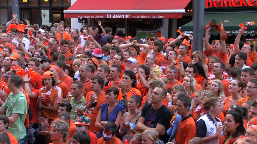 GRONINGEN, HOLLAND - JULY 11: Dutch soccer fans supporting their team during the final of the FIFA World Cup 2010 Netherlands vs. Spain - July 11, 2010 in Groningen, the Netherlands.
