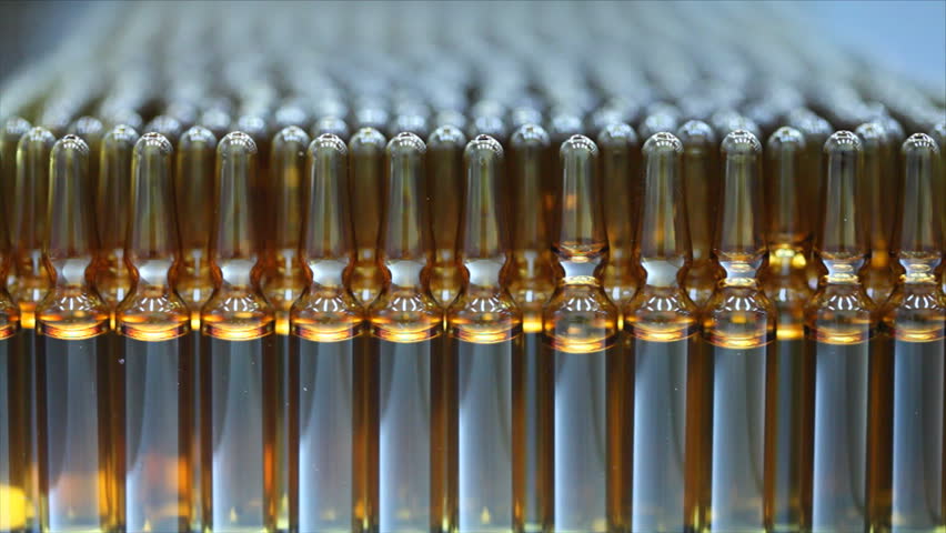 Optical inspection, inspects vials and ampoules for particulates in liquid and container defects. Soft focus and Shallow DOFF.