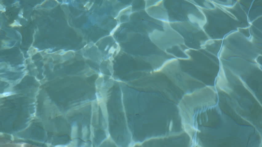 Light refraction (caustics) on the water surface of a swimming pool